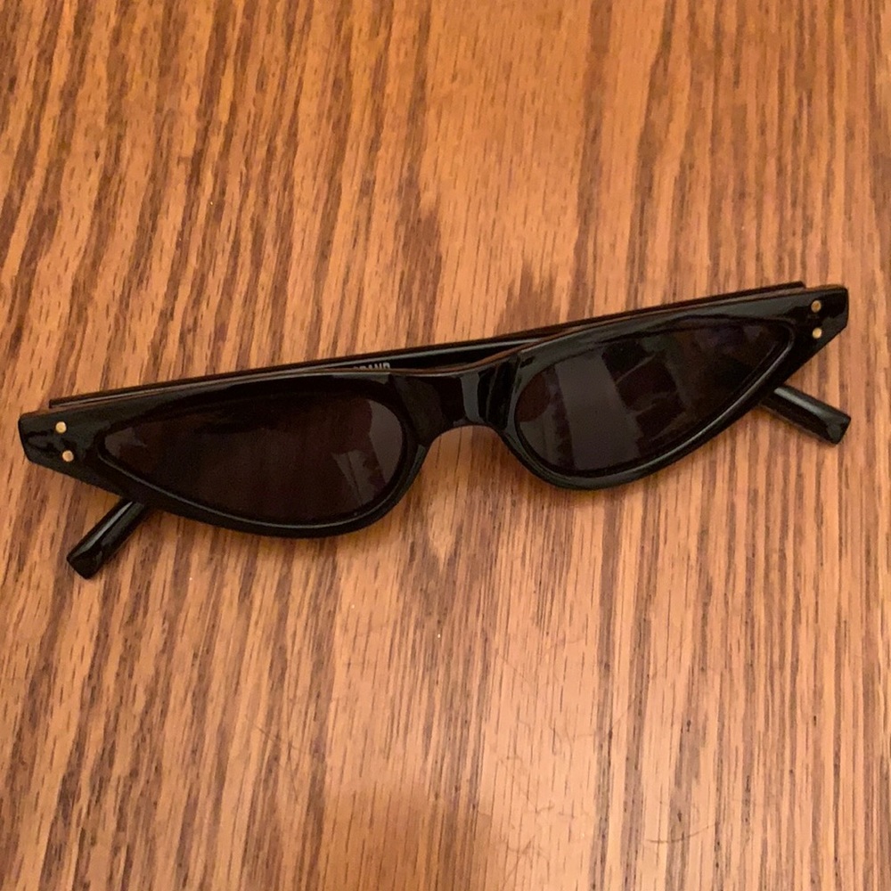 Tiny black sunglasses